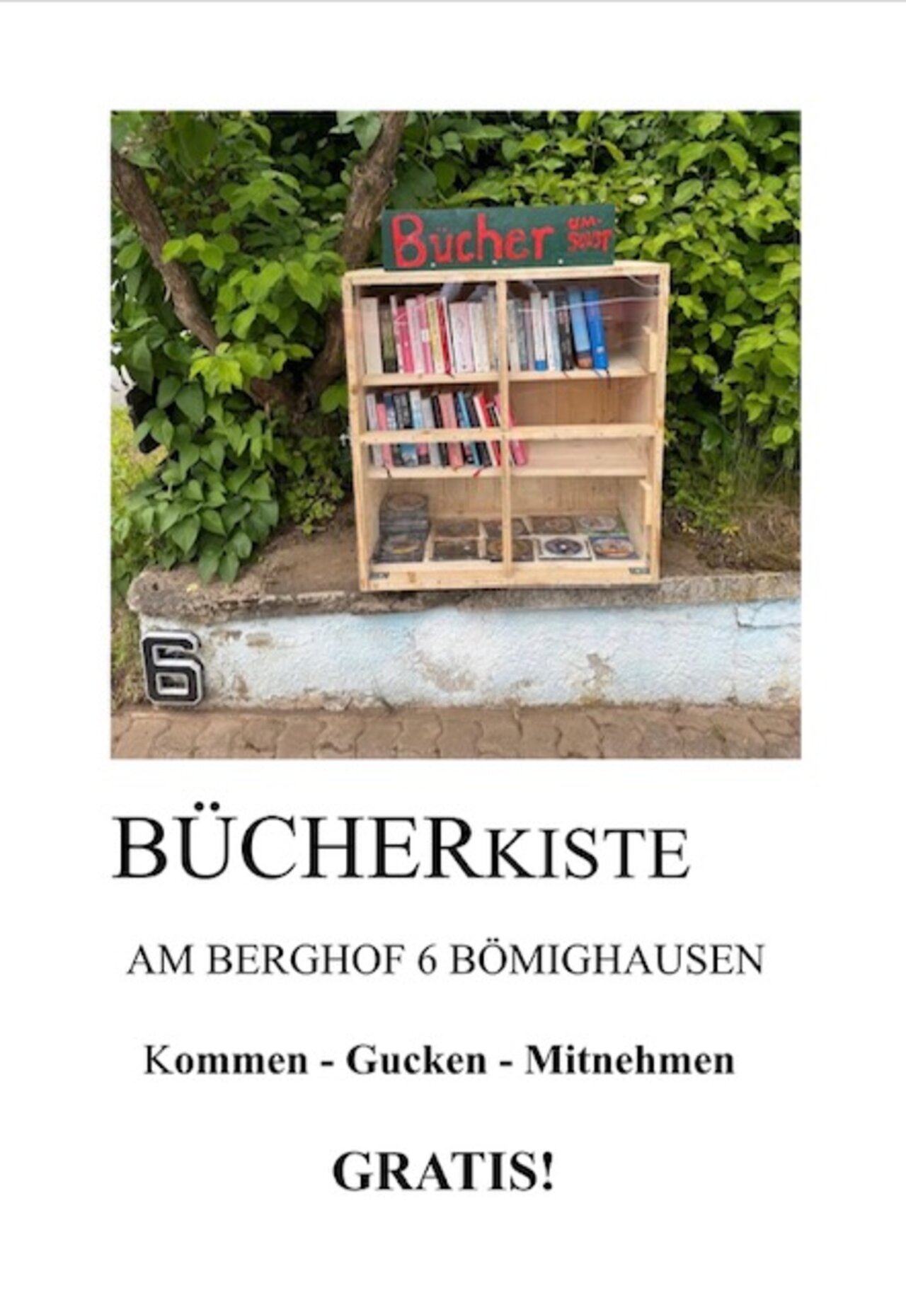 Her sehen Sie eine Bücherkiste wo Bilder und CD-DVD zum verschenken gelagert werden. Diese kann sich jeder gratis mit nehmen. 